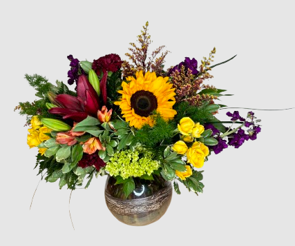 A vase of flowersDescription automatically generated