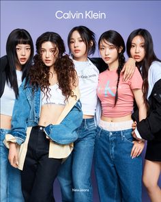 This contain an image of  ADOR NewJeans all posing together in denim outfits