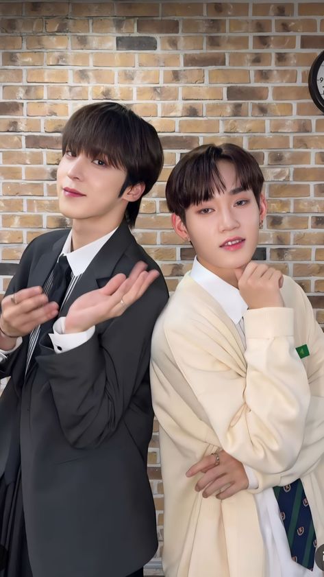 A picture of ATEEZ‘s Yunho and B1A4‘s Gongchan putting on black, milk suit