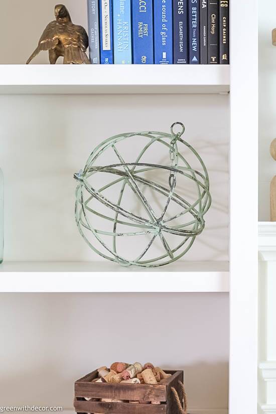 a metal sphere on a shelf