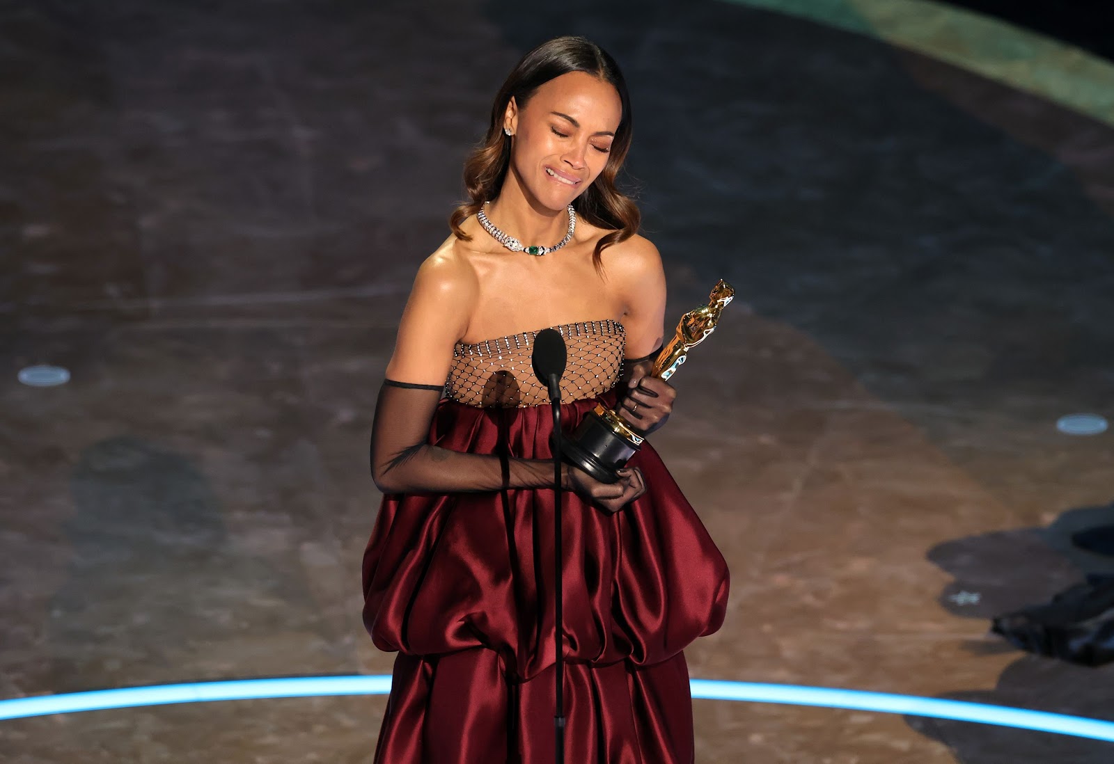 Saldaña <a href="https://www.cnn.com/entertainment/live-news/oscars-academy-awards-03-02-25#cm7se9b3d00153b6n6lkvixt2">accepts the best supporting actress Oscar</a>. She won for her role in "Emilia Pérez" and dedicated her Oscar to her grandmother, noting that she is a proud child of immigrant parents. “The fact that I am getting an award for a role where I got to sing and speak in Spanish? My grandmother, if she were here, would be so delighted."