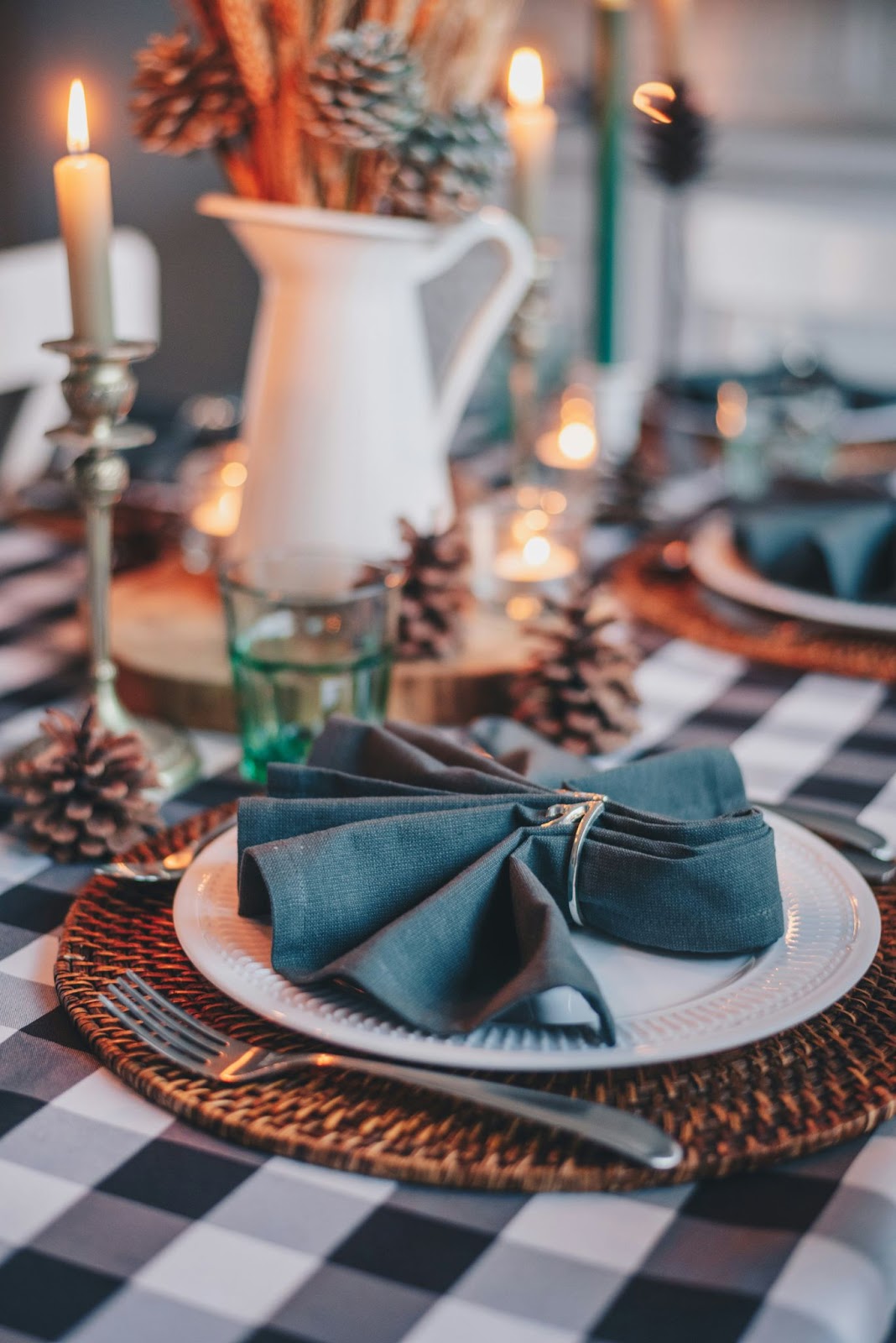 Transitional place setting with rattan placemat and silver cutlery