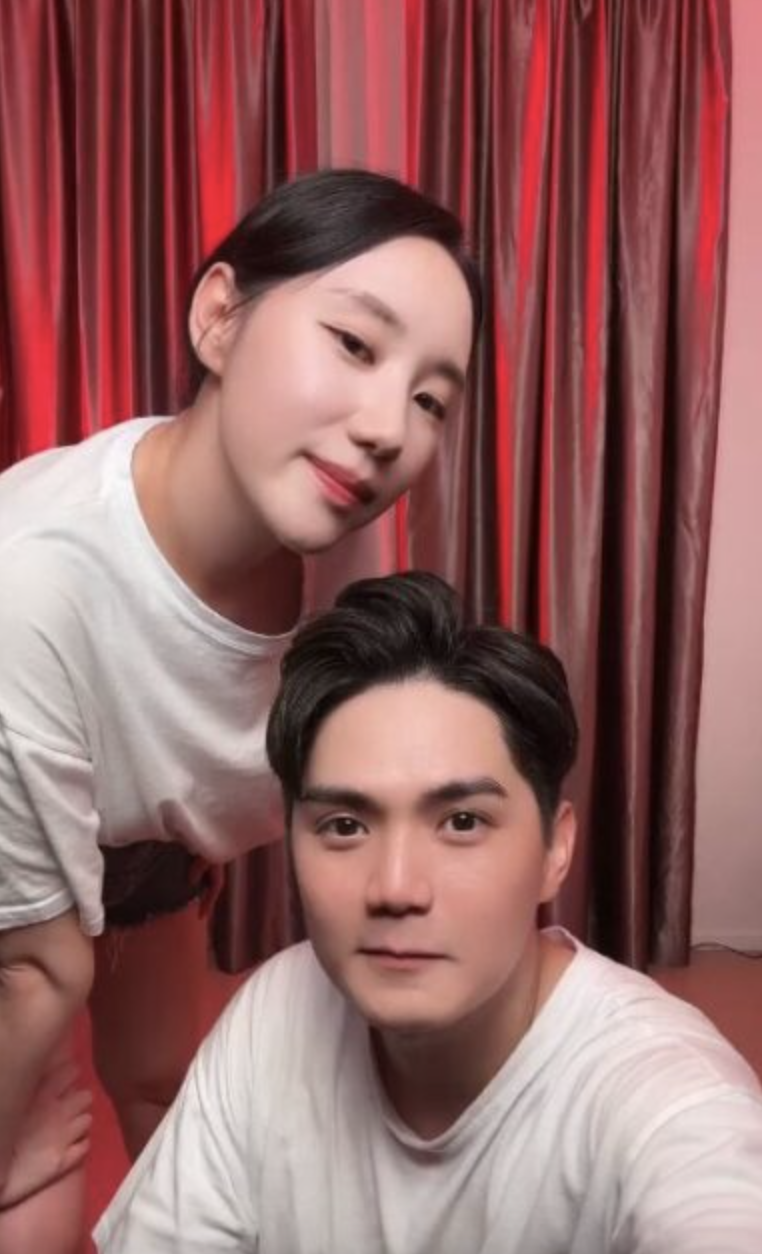 A picture of former trainee Vivian Jo Hyeon Gi and her husband Lawrence, a former Mandopop singer