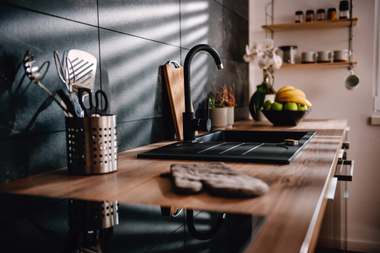 signs that its time for a kitchen remodel poorly lit countertop and sink area custom built michigan