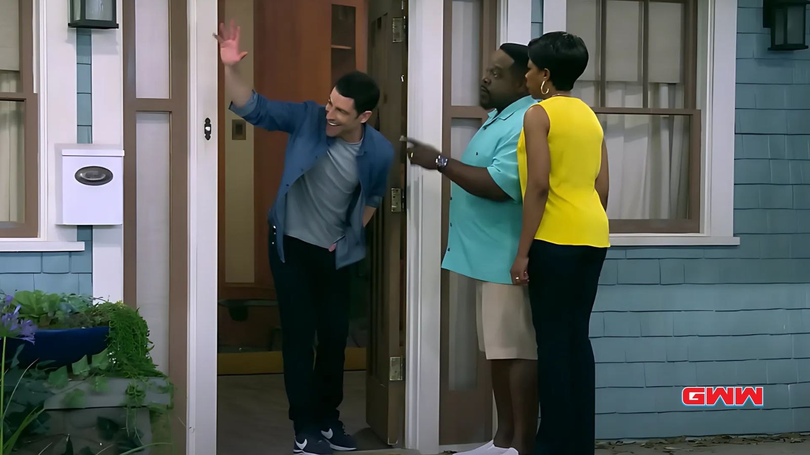 Max Greenfield greeting Cedric the Entertainer and Tichina Arnold at the door.