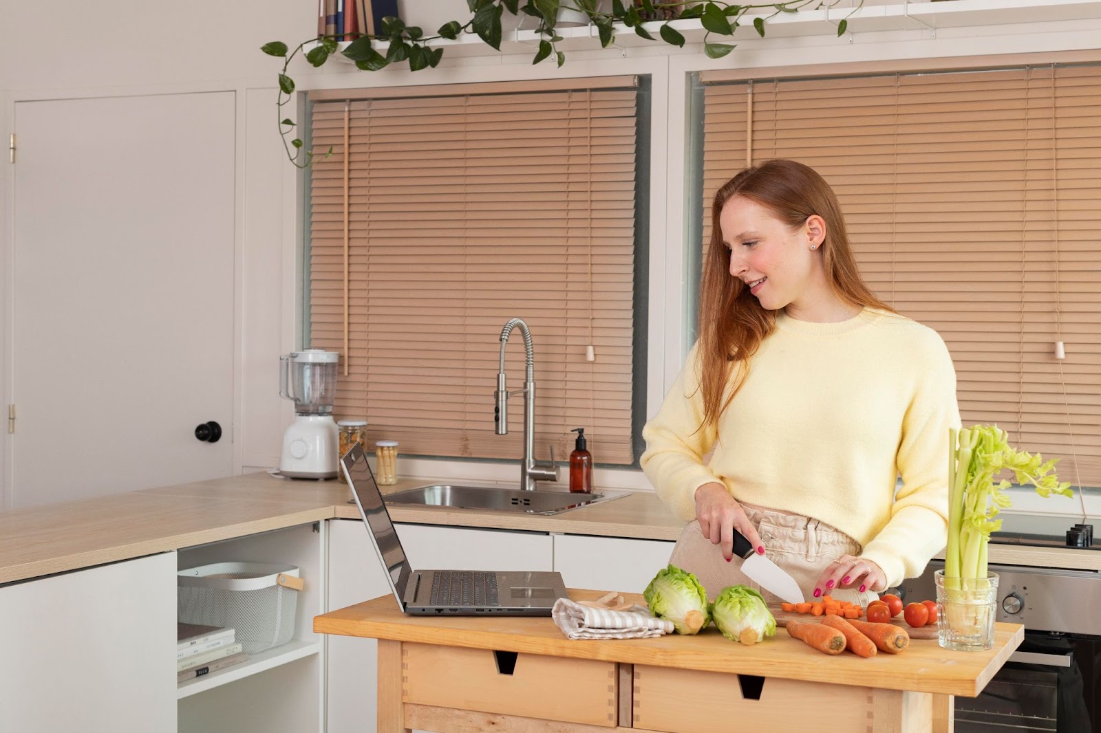 woman cutting vegetables_Preferred Construction