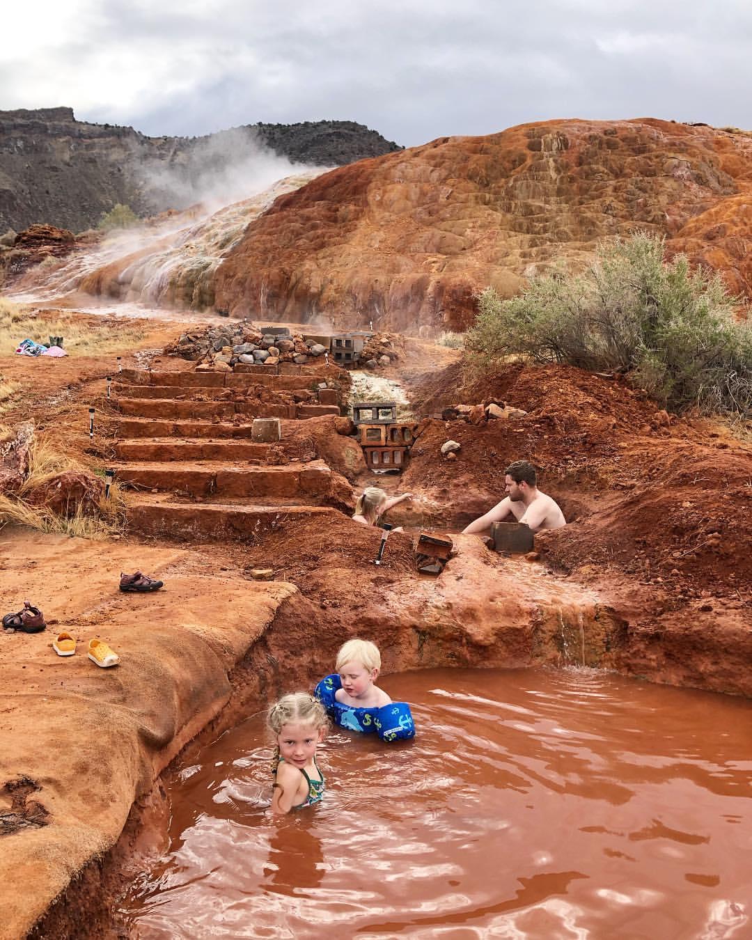 Families picniking near the red hill hot springs