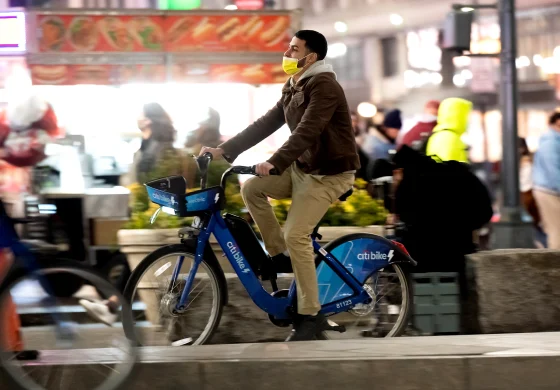 shared e-bikes, man riding an electric bike