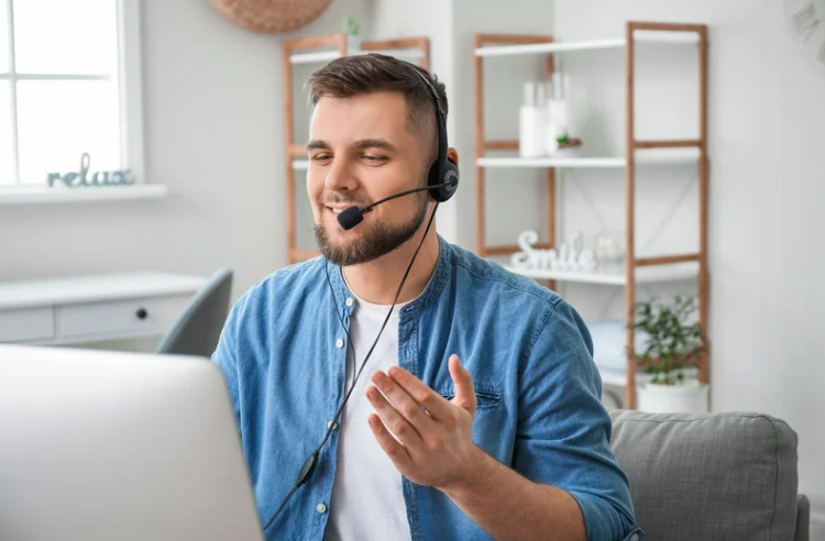 Electrical company dispatcher talking to field employees through a headset