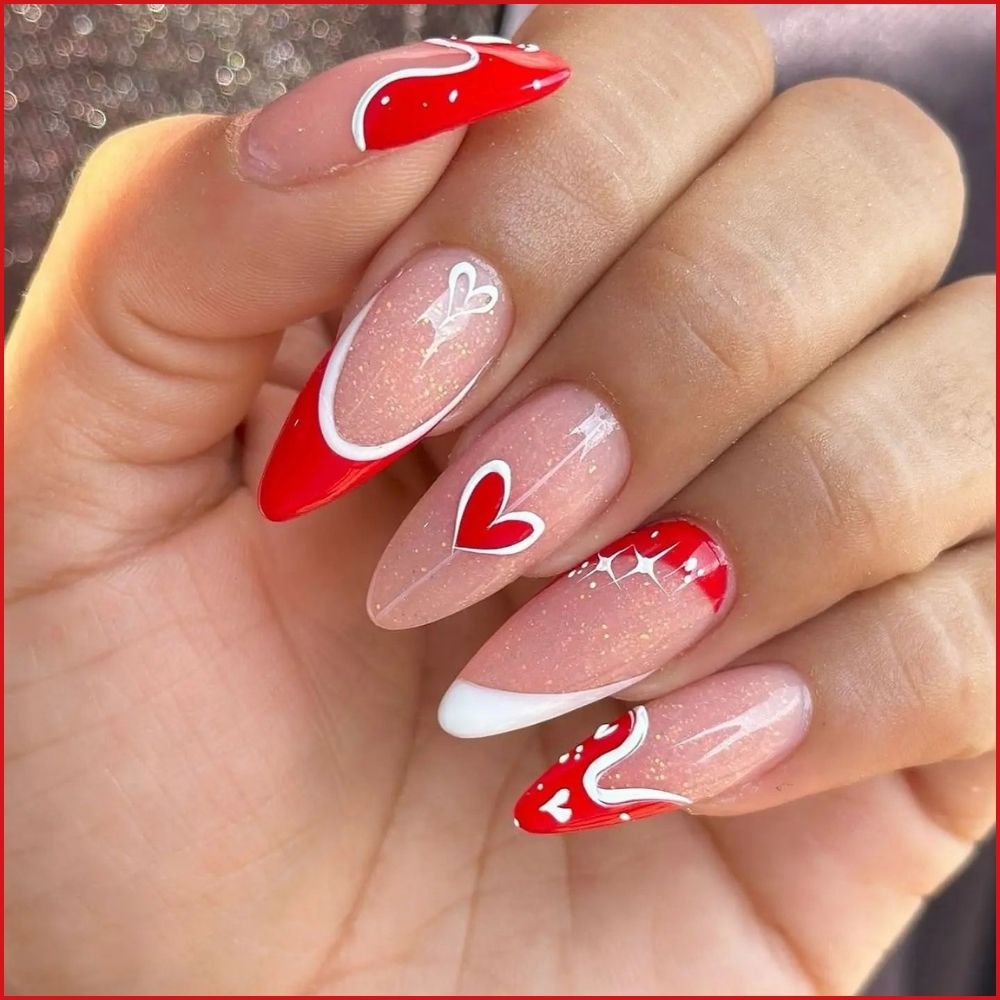 Zoom in view of hand with simple French tip nail having Valentine nails