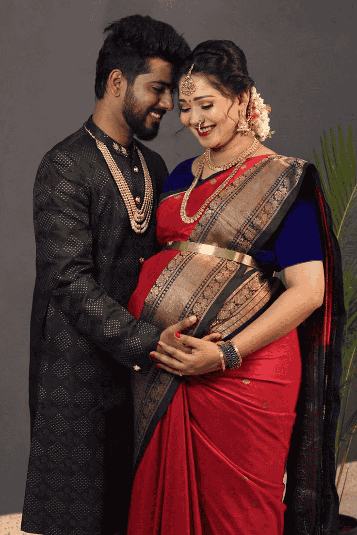 Traditional maternity photoshoot showcasing the beauty of capturing heartfelt, intimate moments