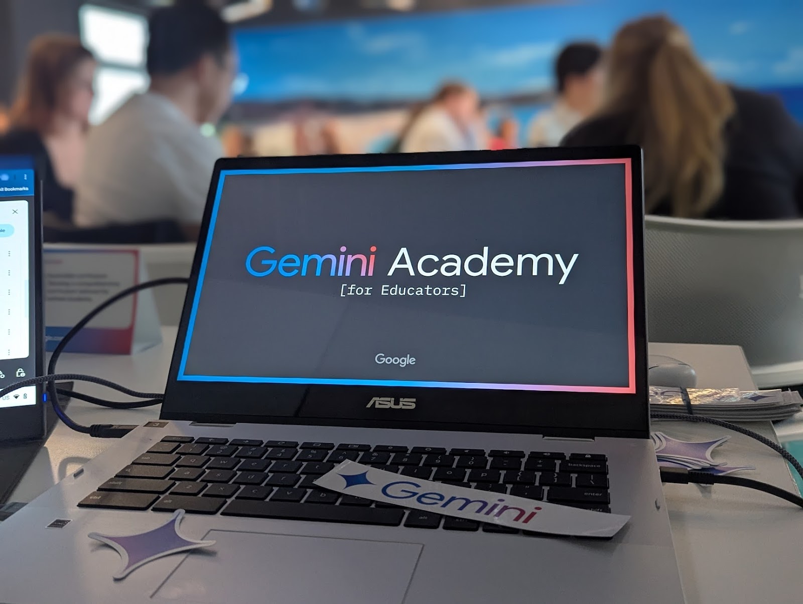 A chromebook screen with the the Gemini Academy logo. 