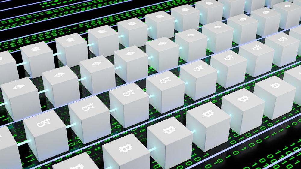 a large array of white cubes with numbers and symbols on them