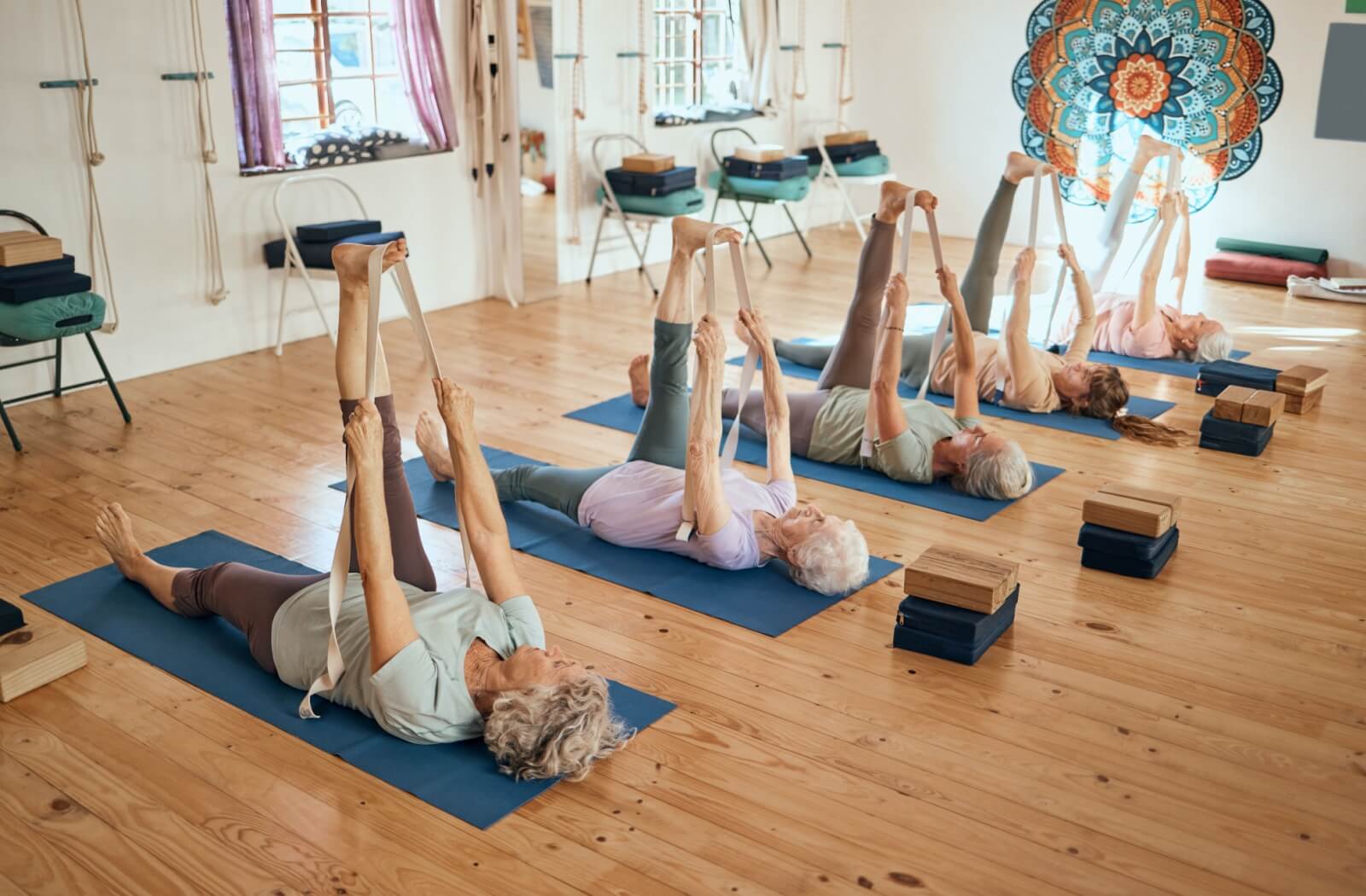 A yoga class at a senior living community to help with wellness & mobility.