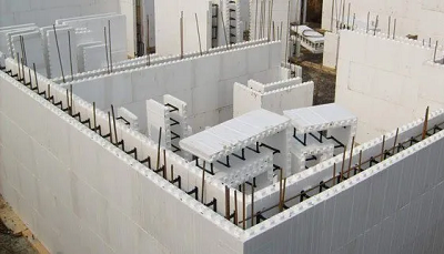 A white building with many pieces of foam

Description automatically generated with medium confidence