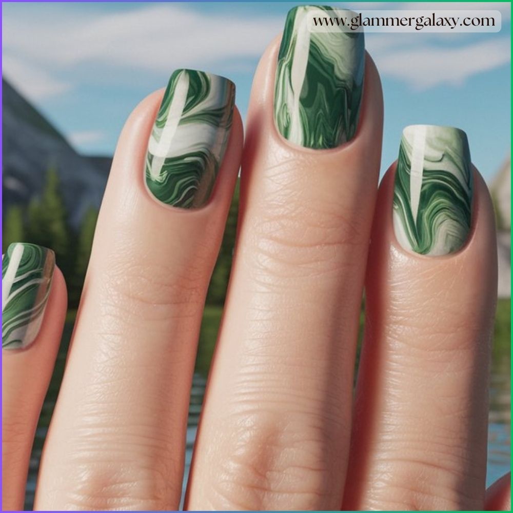 Close up of green fall nails Achieving the Marble Effect