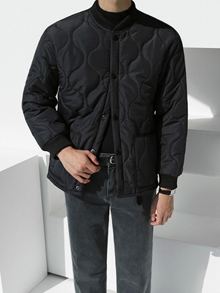 korean mens fashion: Minimalist Quilted Elegance: A Korean Man’s Refined Casual Look