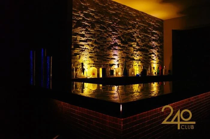 gay sauna bar with liquor and brick backsplash location in 240 club gay sauna near you in lima, peru for gay anonymous hookup encounters image via travelgay.com