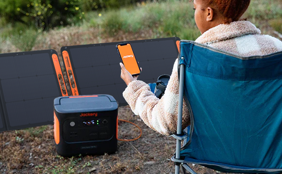 A person sitting in a chair using a phone

Description automatically generated