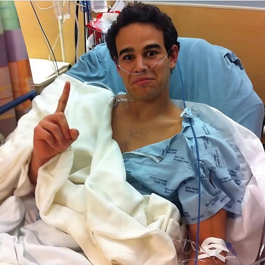 May be an image of 1 person, hospital and text