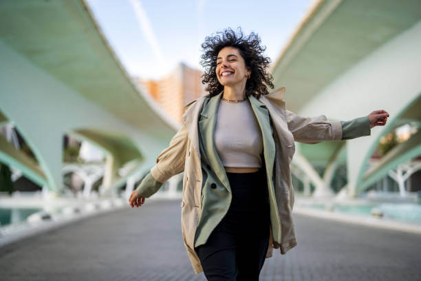 A relaxed, happy woman enjoying a stress-free life with the support of North Century Pharmacy's wellness solutions.