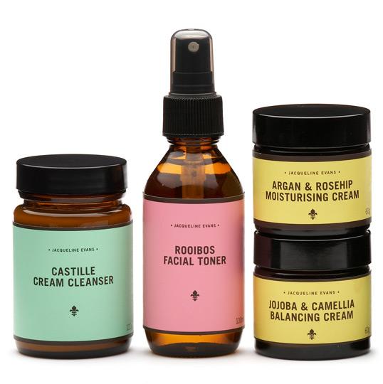 A group of bottles of cream and cream Description automatically generated
