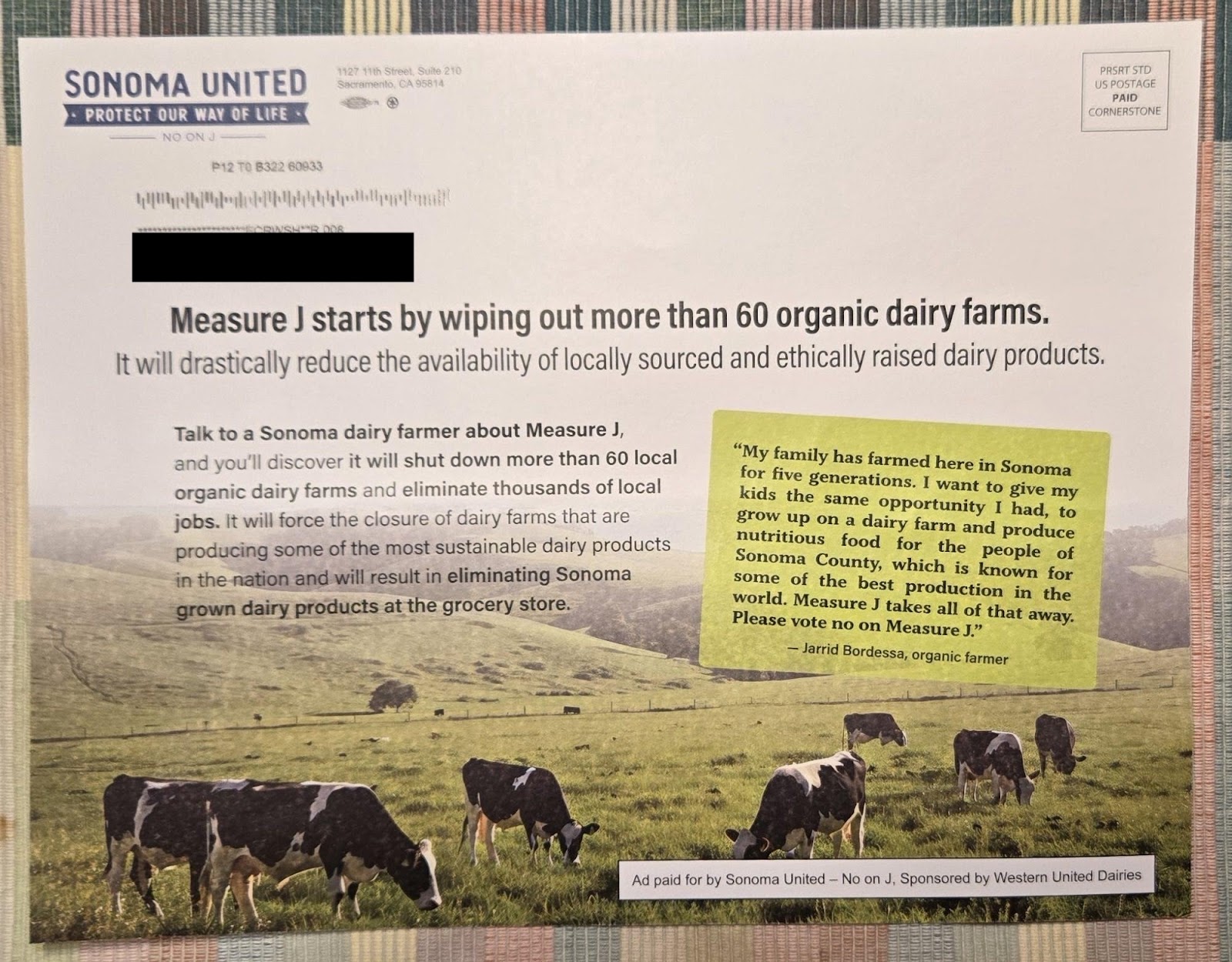 A mail flyer from Sonoma United encouraging voters to vote no on Measure J. Part of the text reads "Measure J starts by wiping out more than 60 organic dairy farms."