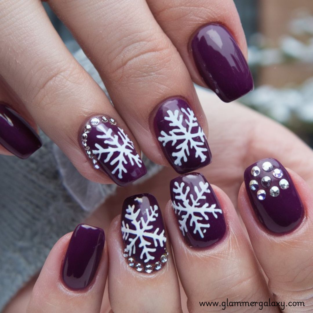 Snowflake Nails having Deep Purple Winter Nail Design
