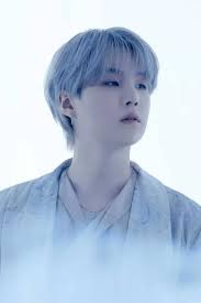 A picture of BTS members Suga