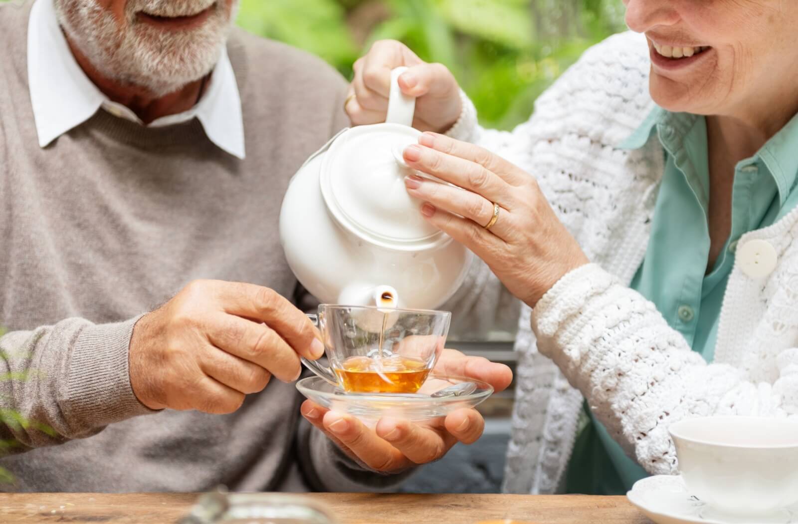 A couple shares an herbal tea instead of drinking sugary drinks.