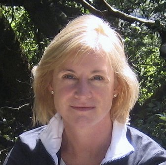 A person with blonde hair Description automatically generated