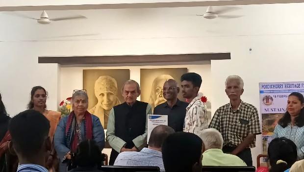 Karthick, a Computer Science & Engineering student from Sri Manakula Vinayagar Engineering College, receiving 2nd place award in the photography category at the Pondicherry Heritage Festival’s Creative Expressions Competition.
