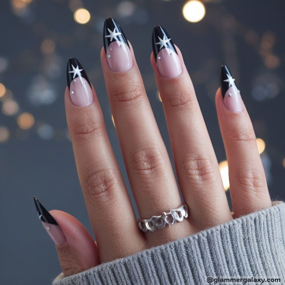 French Tip Christmas Nails having Black Tips with Silver Stars
