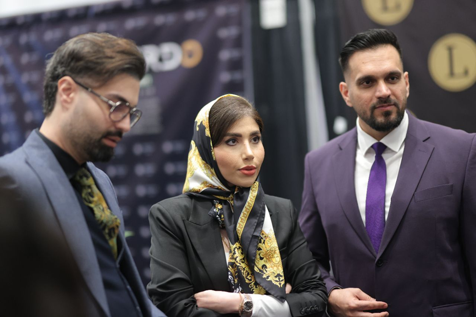 ahmad ayoubi pour beside his family