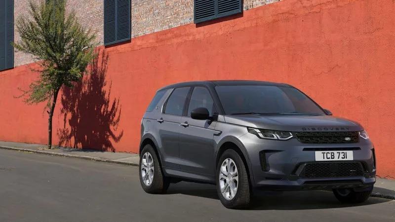 A car parked on the side of a road

Description automatically generated
