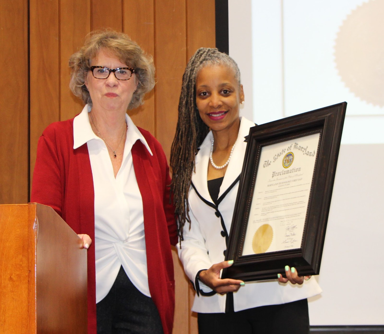 Maryland Department of Disabilities Secretary Carol Beatty and MDH Deputy Secretary Marlana R. Hutchinson present the 2024 governor's proclamation declaring Maryland a Technology First State.