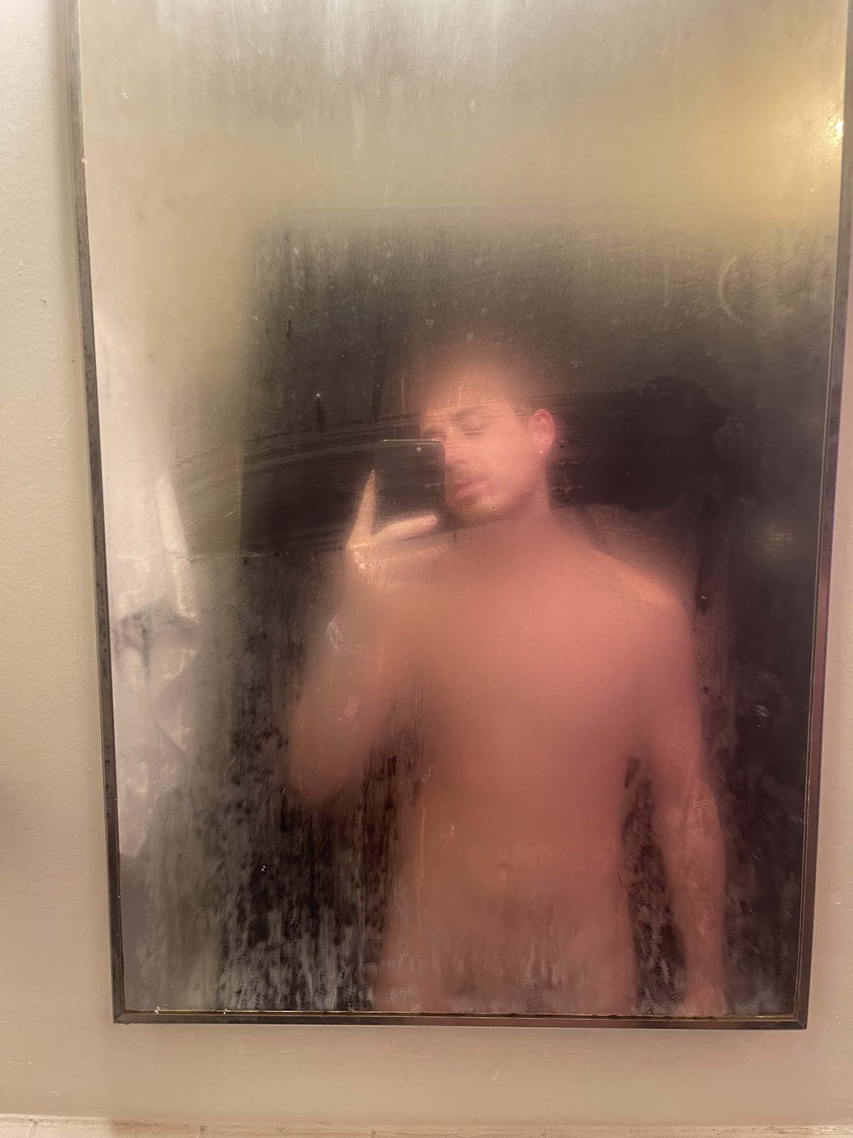 Dallas Knoxxxx taking iphone mirror selfie naked in foggy mirror after steamy jerk off shower session