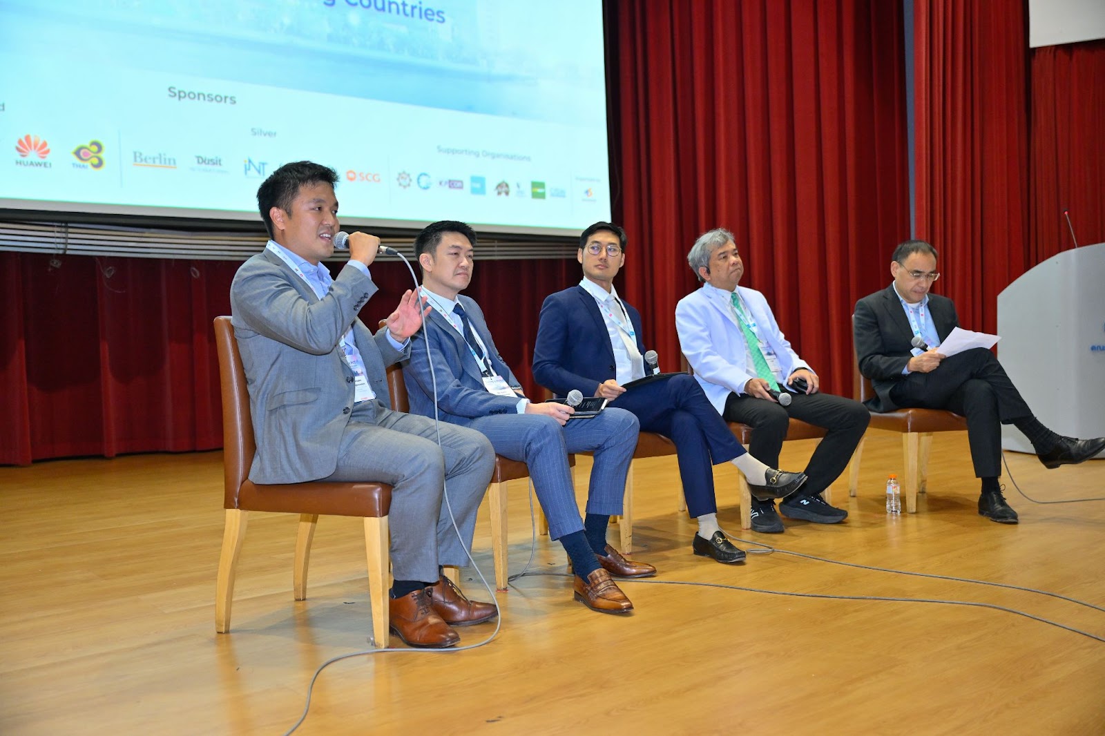 Dr. Sutee Mokkhavesa, Dr.Ukrit Angkawinitwong, Assoc. Prof. Trongtum Tongdee and  Dr Thanadet Chuangsuwanich conferring on the topic of  Scaling Aged Care using AI