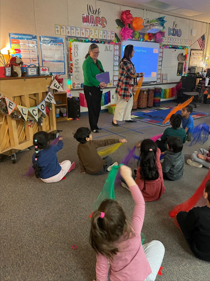 Dr. Reid observing a first grade classroom at McNair Elementary School. 