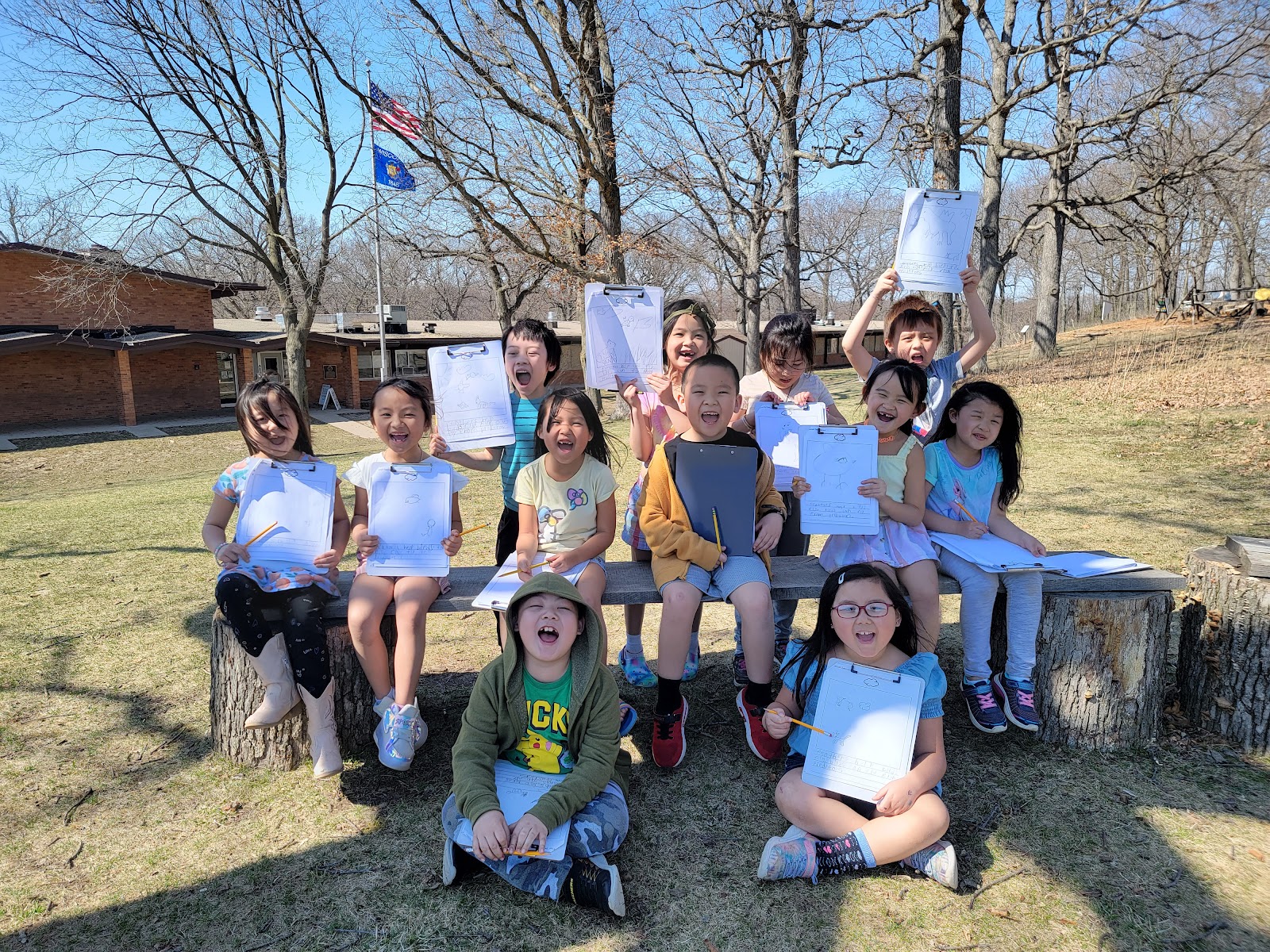 students do classwork outdoors