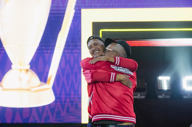 Ryan Dacalos hugging Tatay Benigno