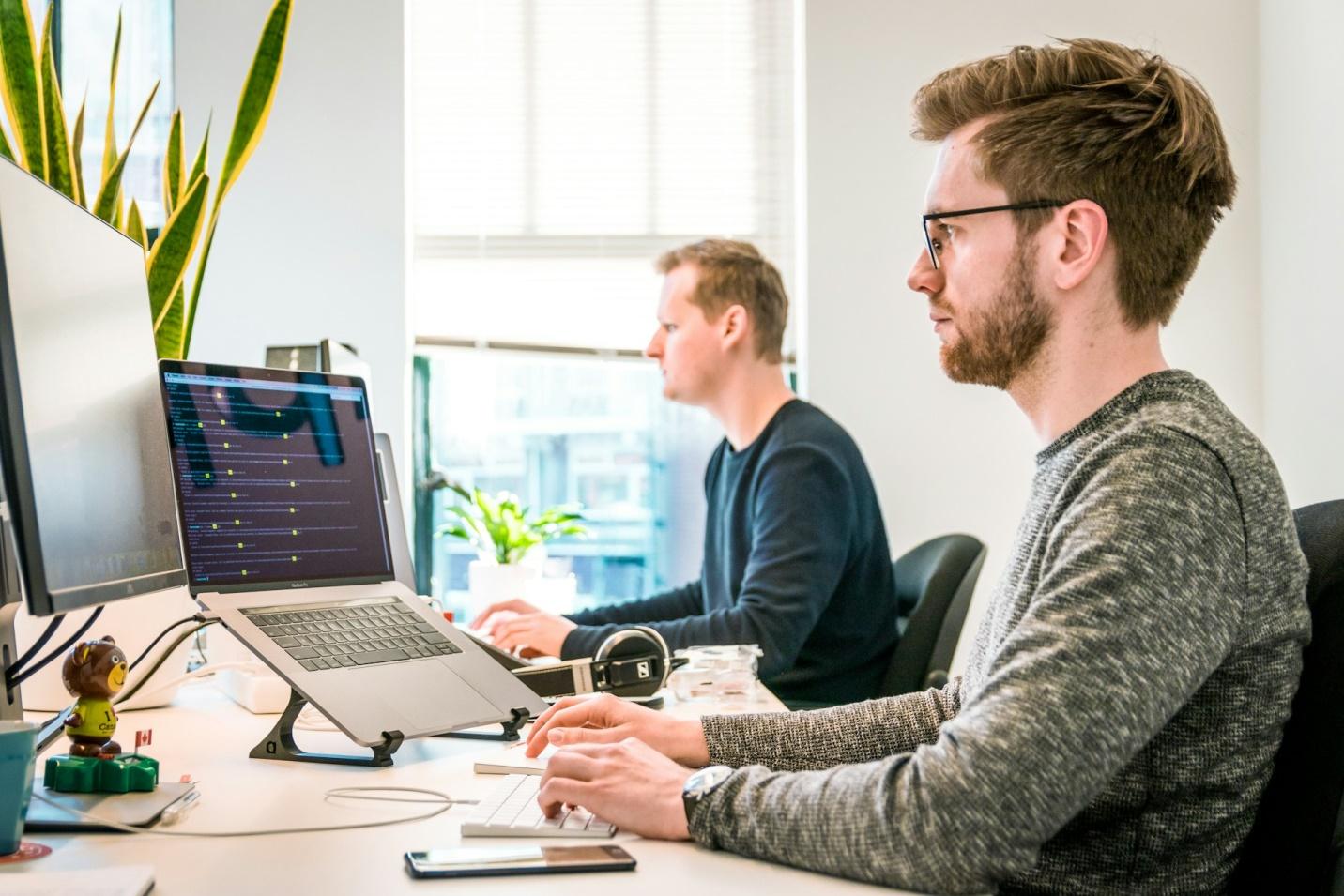 Men working on a project