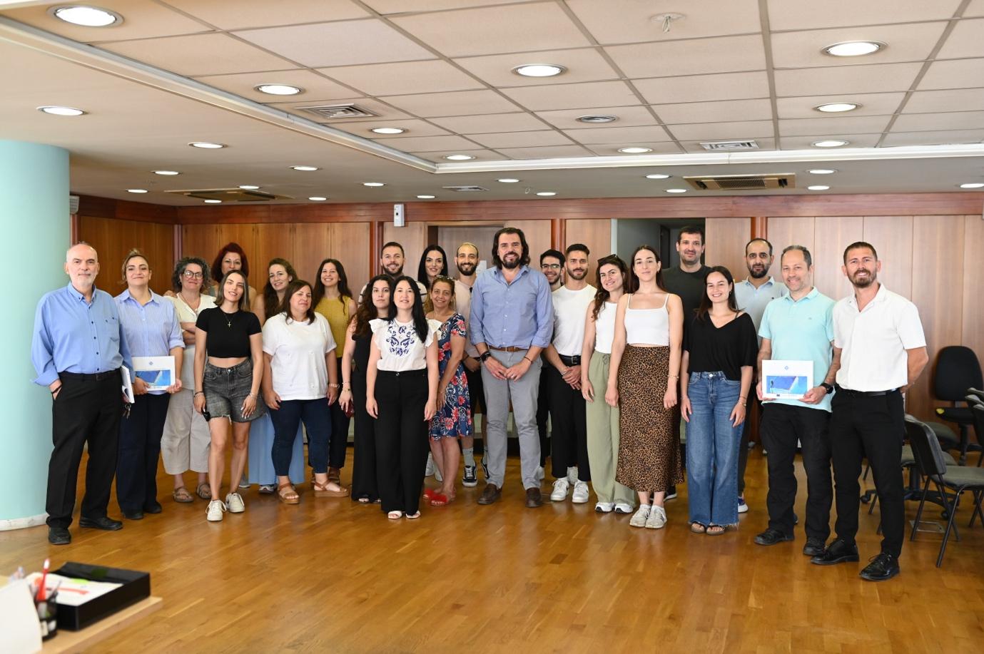 A group of people standing together

AI-generated content may be incorrect.