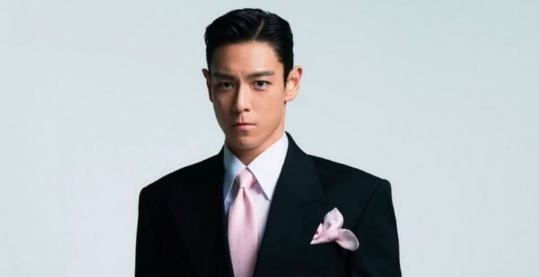 This contains an image of Big Bang T.O.P