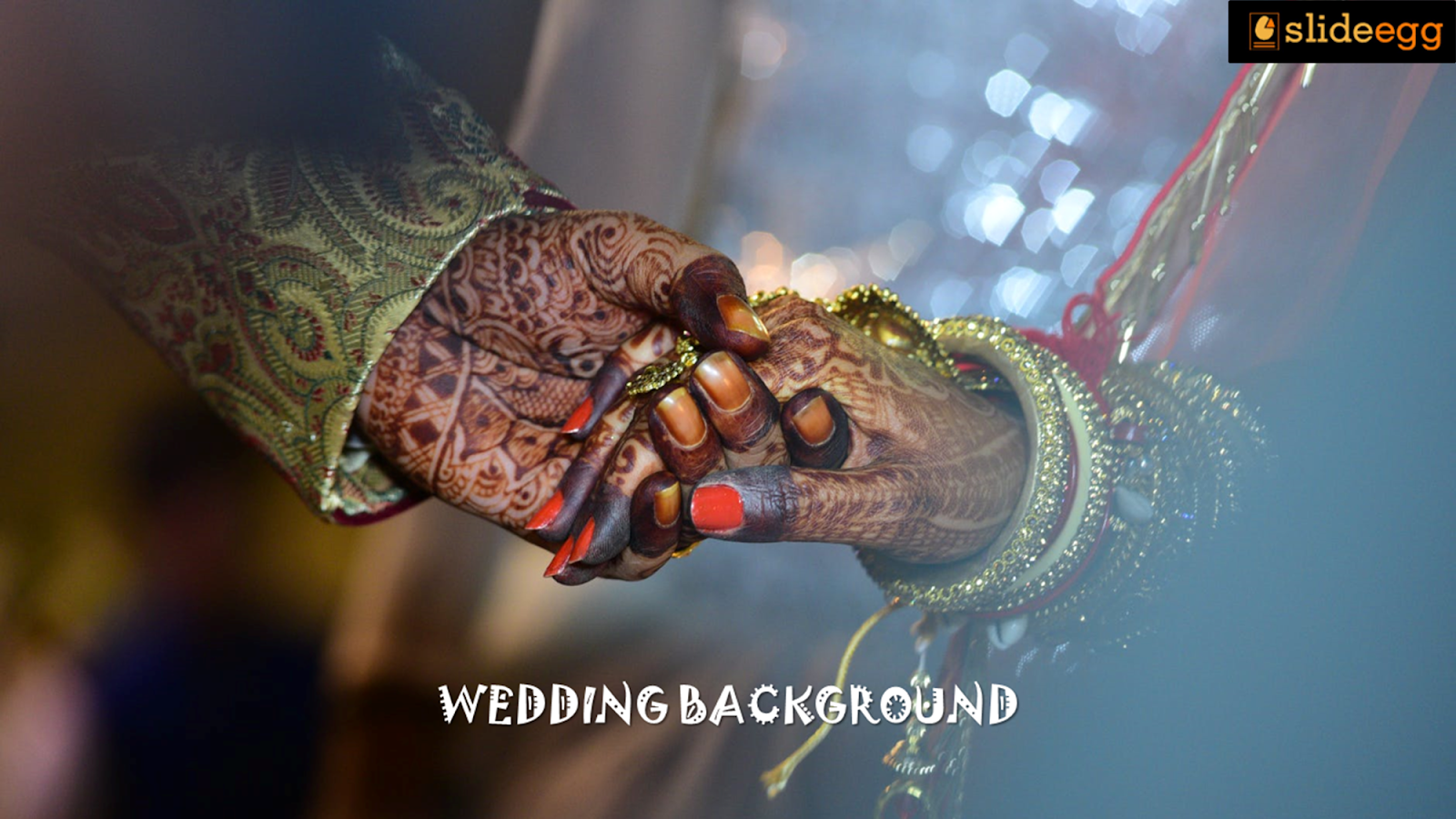 Traditional Indian wedding hands with henna designs symbolizing cultural marriage rituals.