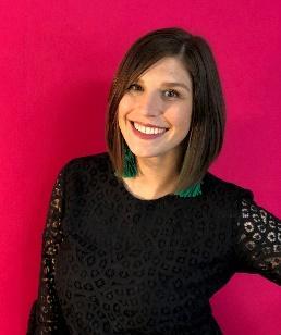 A person smiling for the camera
Description automatically generated with medium confidence