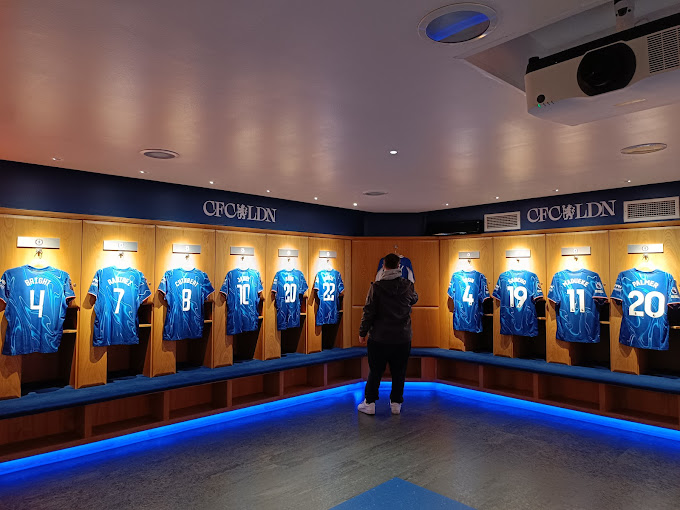 Visitors exploring the iconic Stamford Bridge stadium, home of Chelsea FC, during the immersive Chelsea FC Stamford Bridge Tour in London.