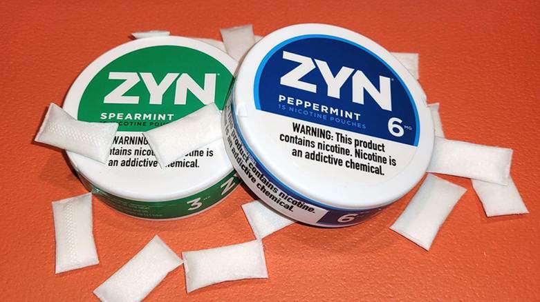 A close-up of a couple of round containers

AI-generated content may be incorrect.