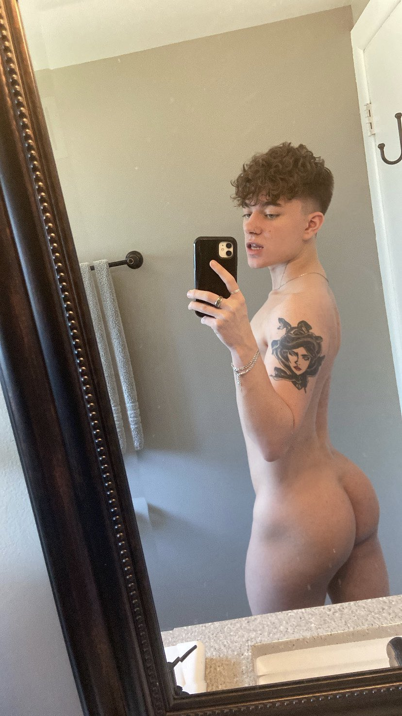 gay horny tattooed twink Dillon Faze taking an naked iphone mirror selfie showing off his gay bubble butt