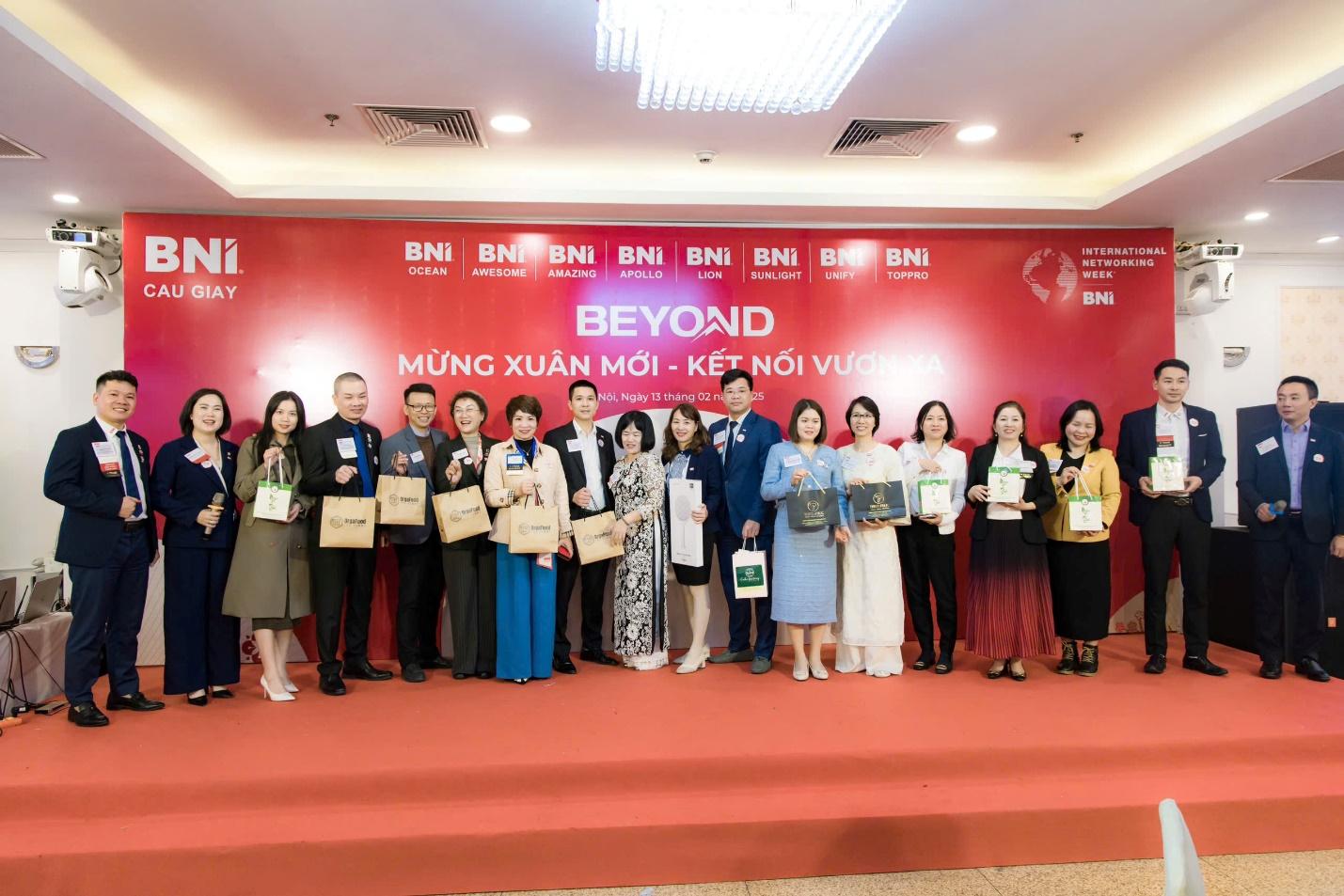 A group of people standing on a red carpetAI-generated content may be incorrect.